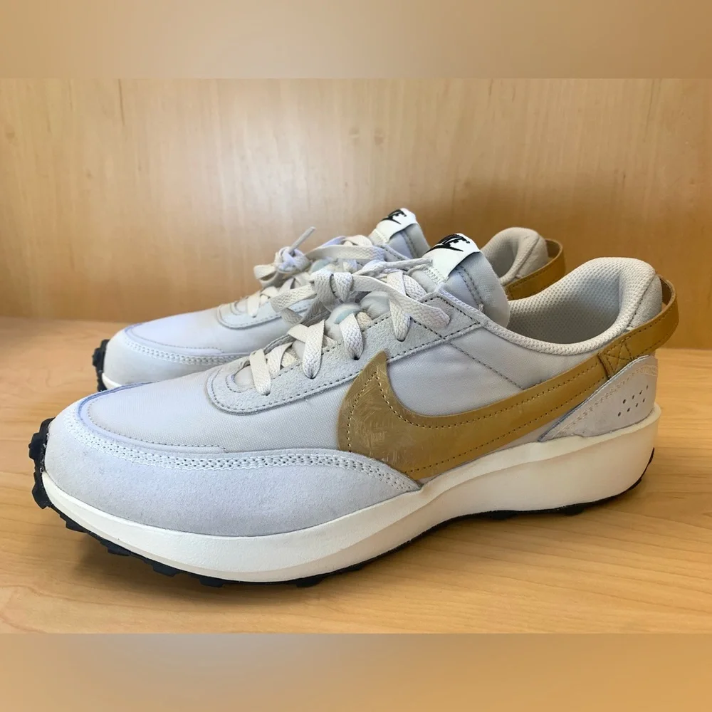 Nike Women's Light Gray Sneakers with Mustard Swoosh